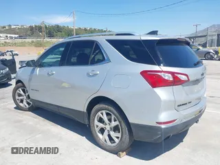 2020 Chevrolet Equinox LT with VIN 3GNAXLEX2LS609943, listed as a IAAI auction lot 42014464 with 80,942 mi miles. Bid and sale history available at carsss.com. Image 3.