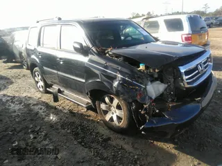 2012 Honda Pilot Touring with VIN 5FNYF3H90CB035309, listed as a IAAI auction lot 41063215 with 228,081 mi miles and . Bid and sale history available at carsss.com. Image 1.