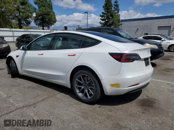 2022 Tesla Model 3 Long Range with VIN 5YJ3E1EB4NF139023, listed as a Copart auction lot 51410345 with 54,789 mi miles and Salvage Title. Bid and sale history available at DreamBid. Image 2.