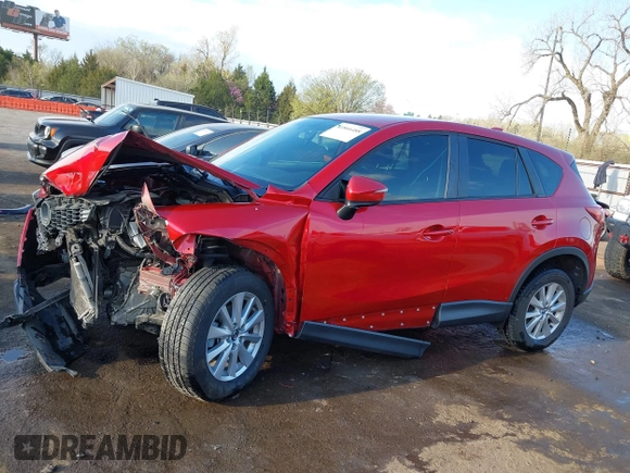 2015 Mazda CX-5 Sport z VIN JM3KE2BE7F0516869, wystawiony jako IAAI lot #41866488 z przebiegiem 131 237 mil mil oraz . Historia ofert i sprzedaży dostępna na DreamBid. Obrazek 14.