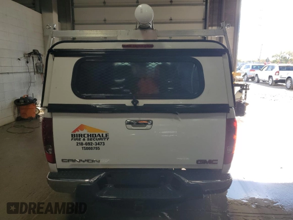 2011 GMC Canyon with VIN 1GTJ6LFE4B8139009, listed as a Copart auction lot 76472774 with 151,484 mi miles and Clean title. Bid and sale history available at DreamBid. Image 6.