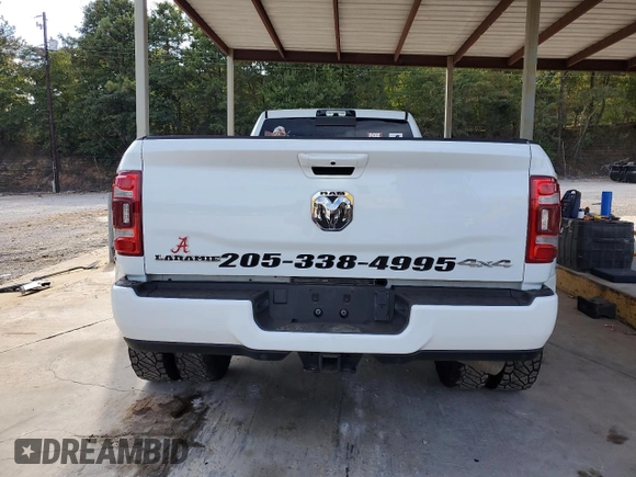2023 Ram 3500 Laramie with VIN 3C63RRJL6PG522516, listed as a Copart auction lot 69699634 with 34,312 mi miles and Salvage Title. Bid and sale history available at carsss.com. Image 6.