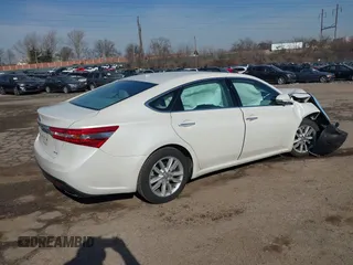 2014 Toyota Avalon Limited with VIN 4T1BK1EB7EU106282, listed as a IAAI auction lot 41608942 with Not Provided miles. Bid and sale history available at carsss.com. Image 4.