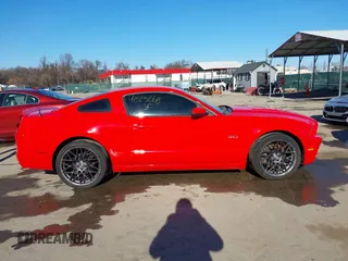 2013 Ford Mustang GT with VIN 1ZVBP8CFXD5215667, listed as a IAAI auction lot 41525268 with 129,561 mi miles and . Bid and sale history available at DreamBid. Image 13.