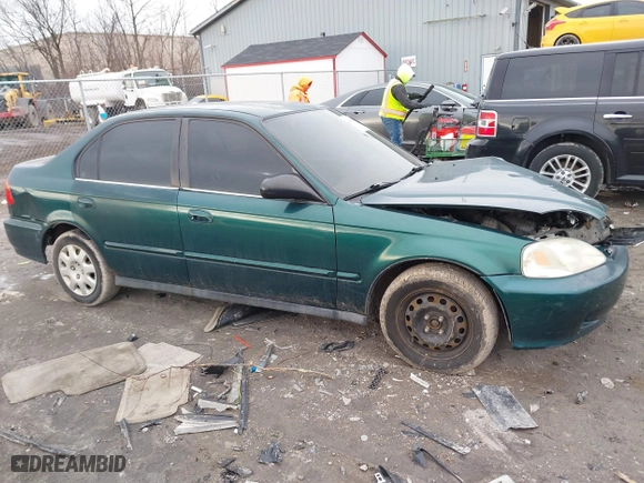 1999 Honda Civic VP with VIN 2HGEJ6617XH537283, listed as a IAAI auction lot 41483084 with 153,655 mi miles. Bid and sale history available at carsss.com. Image 13.