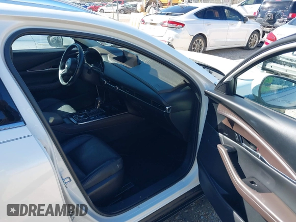 2022 Mazda CX-30 S Premium with VIN 3MVDMBDL1NM413540, listed as a IAAI auction lot 41681191 with 57,764 mi miles and . Bid and sale history available at carsss.com. Image 5.