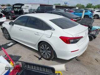 2024 Honda Civic EX z VIN 2HGFE1F7XRH323682, wystawiony jako IAAI lot #42019454 z przebiegiem 7 039 mil mil oraz . Historia ofert i sprzedaży dostępna na DreamBid. Obrazek 3.