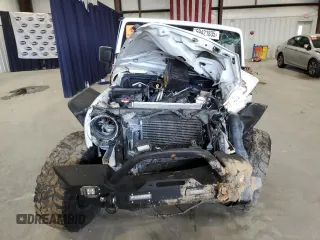 2016 Jeep Wrangler Unlimited Freedom with VIN 1C4BJWDG9GL199557, listed as a Copart auction lot 59421835 with 171,838 mi miles and Salvage title. Bid and sale history available at DreamBid. Image 5.