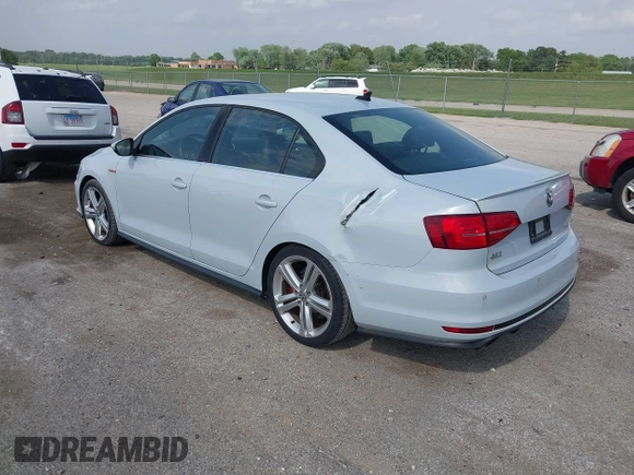 2017 Volkswagen Jetta GLI z VIN 3VW5T7AJ0HM338792, wystawiony jako IAAI lot #42285176 z przebiegiem 95 566 mil mil oraz . Historia ofert i sprzedaży dostępna na DreamBid. Obrazek 3.