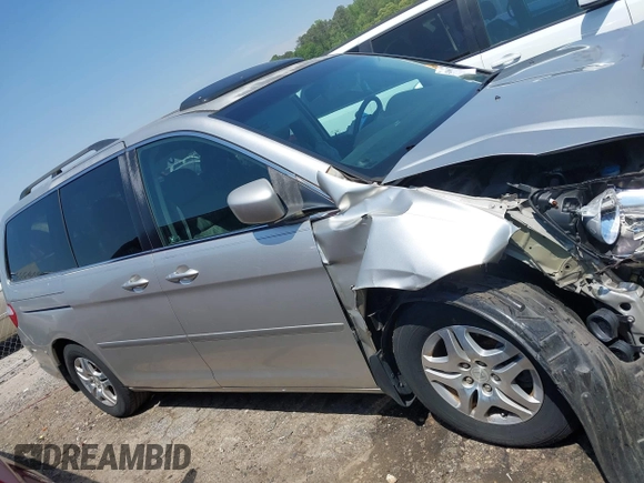 2007 Honda Odyssey EX-L z VIN 5FNRL38667B453060, wystawiony jako IAAI lot #42066637 z przebiegiem 184 439 mil mil oraz . Historia ofert i sprzedaży dostępna na DreamBid. Obrazek 13.