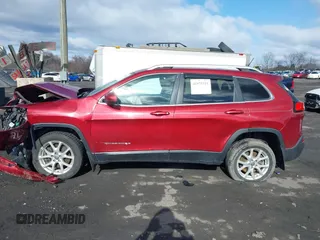 2014 Jeep Cherokee Latitude z VIN 1C4PJMCSXEW141453, wystawiony jako IAAI lot #41975311 z przebiegiem 150 085 mil mil oraz . Historia ofert i sprzedaży dostępna na DreamBid. Obrazek 14.