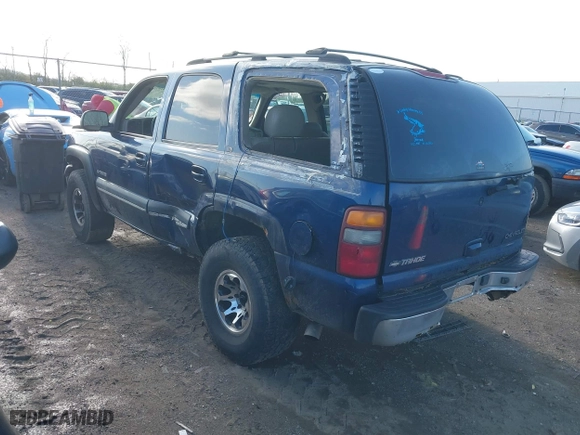 2002 Chevrolet Tahoe LT with VIN 1GNEK13Z42J140816, listed as a IAAI auction lot 41973686 with 241,722 mi miles. Bid and sale history available at carsss.com. Image 3.