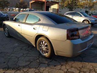 2006 Dodge Charger R/T with VIN 2B3KA53H26H361580, listed as a IAAI auction lot 40874293 with 239,930 mi miles. Bid and sale history available at carsss.com. Image 3.
