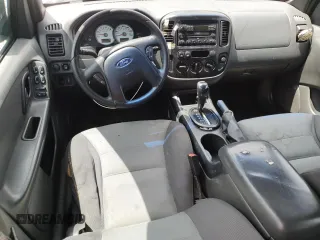 2005 Ford Escape XLS Value with VIN 1FMYU92Z95DA22100, listed as a Copart auction lot 57874705 with 192,057 mi miles and Salvage title. Bid and sale history available at DreamBid. Image 8.