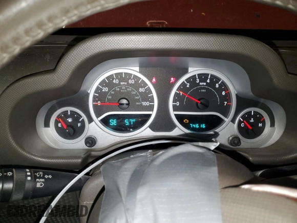 2007 Jeep Wrangler Sahara z VIN 1J4FA54127L132543, wystawiony jako Copart lot #55891995 z przebiegiem 74 616 mil mil oraz Szkoda całkowita • Salvage title. Historia ofert i sprzedaży dostępna na DreamBid. Obrazek 9.