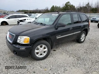 2006 GMC Envoy SLT with VIN 1GKDS13SX62354690, listed as a Copart auction lot 84138814 with 194,669 mi miles and Salvage Title. Bid and sale history available at carsss.com. Image 1.