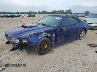 2004 Ford Mustang Deluxe with VIN 1FAFP444X4F107575, listed as a Copart auction lot 60908705 with 148,467 mi miles and Salvage title. Bid and sale history available at DreamBid. Image 1.