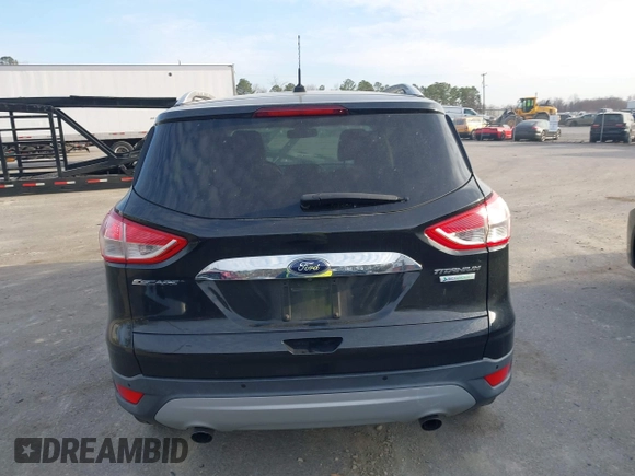 2015 Ford Escape Titanium with VIN 1FMCU0J98FUA19911, listed as a IAAI auction lot 41750596 with 106,706 mi miles. Bid and sale history available at carsss.com. Image 16.