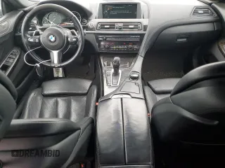 2015 BMW 6 Series 640i xDrive z VIN WBA6B8C55FD452972, wystawiony jako Copart lot #44559495 z przebiegiem 114 358 mil mil oraz Szkoda całkowita • Salvage title. Historia ofert i sprzedaży dostępna na DreamBid. Obrazek 8.