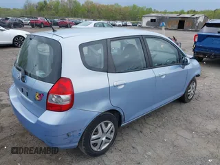 2008 Honda Fit with VIN JHMGD38468S060570, listed as a IAAI auction lot 42016018 with 133,574 mi miles. Bid and sale history available at carsss.com. Image 4.
