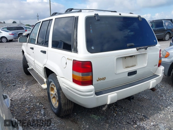 1996 Jeep Grand Cherokee Limited with VIN 1J4GZ78Y1TC381474, listed as a IAAI auction lot 42467661 with 155,587 mi miles and . Bid and sale history available at DreamBid. Image 3.