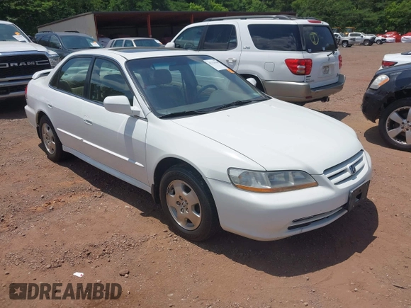 2002 Honda Accord EX z VIN 1HGCG16592A037760, wystawiony jako IAAI lot #42334100 z przebiegiem 271 805 mil mil oraz . Historia ofert i sprzedaży dostępna na DreamBid. Obrazek 1.