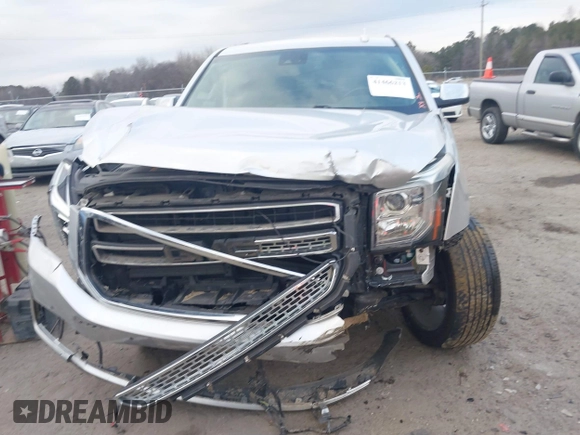 2019 GMC Yukon XL SLT with VIN 1GKS1GKC8KR383694, listed as a IAAI auction lot 41466213 with 128,368 mi miles. Bid and sale history available at carsss.com. Image 12.