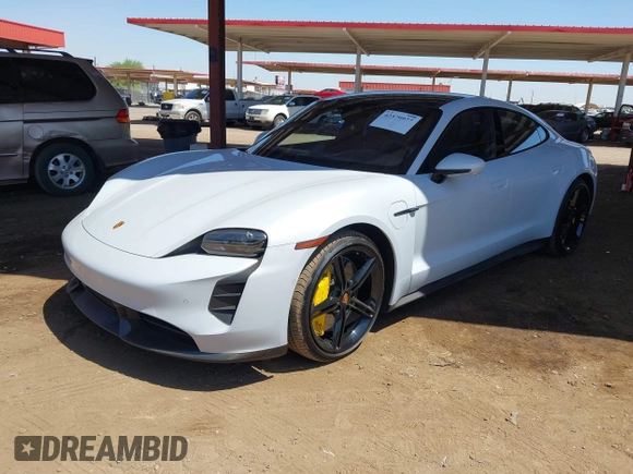 2021 Porsche Taycan Turbo z VIN WP0AC2Y1XMSA63835, wystawiony jako IAAI lot #42579977 z przebiegiem 5 841 mil mil oraz . Historia ofert i sprzedaży dostępna na DreamBid. Obrazek 2.