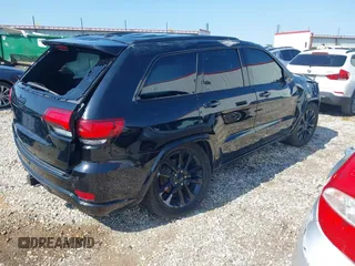 2017 Jeep Grand Cherokee Laredo with VIN 1C4RJFAG7HC894947, listed as a IAAI auction lot 40041978 with 1 mi miles. Bid and sale history available at carsss.com. Image 4.
