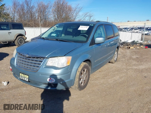2010 Chrysler Town & Country Touring with VIN 2A4RR5D13AR308522, listed as a IAAI auction lot 41673246 with 125,647 mi miles. Bid and sale history available at carsss.com. Image 2.