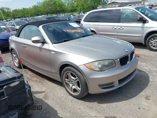2011 BMW 1 Series 128i with VIN WBAUL7C5XBVE87044, listed as a IAAI auction lot 42095602 with 163,049 mi miles and . Bid and sale history available at carsss.com. Image 1.