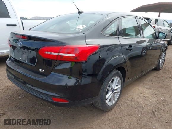 2018 Ford Focus SE with VIN 1FADP3F23JL203672, listed as a IAAI auction lot 41931723 with 110,784 mi miles. Bid and sale history available at carsss.com. Image 4.