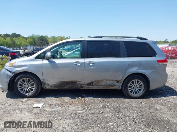2011 Toyota Sienna XLE AAS with VIN 5TDYK3DC3BS083443, listed as a IAAI auction lot 42015856 with 138,045 mi miles and . Bid and sale history available at DreamBid. Image 14.