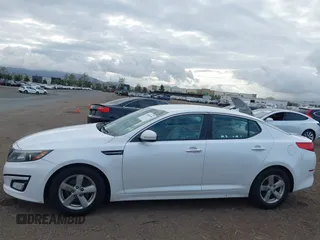 2015 Kia Optima LX with VIN KNAGM4A77F5622299, listed as a IAAI auction lot 42068196 with 200,908 mi miles. Bid and sale history available at carsss.com. Image 14.