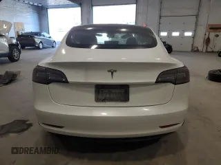 2021 Tesla Model 3 Standard Range Plus z VIN 5YJ3E1EA7MF986964, wystawiony jako Copart lot #55119995 z przebiegiem Nie podano mil oraz Szkody całkowita. Historia ofert i sprzedaży dostępna na DreamBid. Obrazek 6.