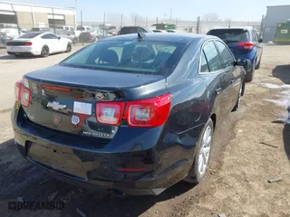 2015 Chevrolet Malibu LTZ with VIN 1G11F5SLXFF173112, listed as a IAAI auction lot 41676519 with 167,885 mi miles. Bid and sale history available at carsss.com. Image 4.