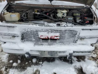 1995 GMC Vandura z VIN 1GDEG25KXSF550311, wystawiony jako Copart lot #78730594 z przebiegiem 149 663 mil mil oraz Szkody całkowita. Historia ofert i sprzedaży dostępna na DreamBid. Obrazek 13.