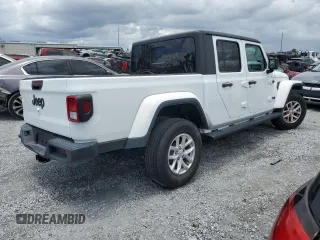 2023 Jeep Gladiator Freedom z VIN 1C6HJTAG6PL535119, wystawiony jako Copart lot #56870905 z przebiegiem 23 707 mil mil oraz Szkoda całkowita • Salvage title. Historia ofert i sprzedaży dostępna na DreamBid. Obrazek 3.