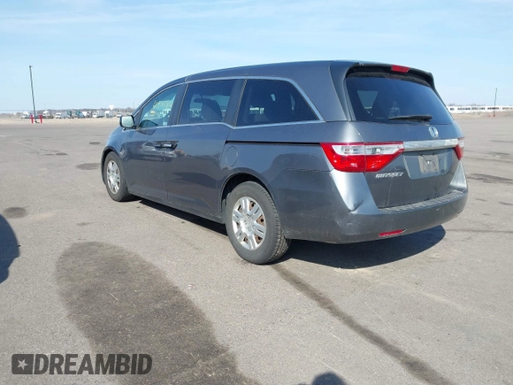 2012 Honda Odyssey LX with VIN 5FNRL5H24CB145694, listed as a IAAI auction lot 41902821 with 134,402 mi miles and . Bid and sale history available at carsss.com. Image 3.