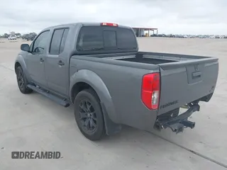 2020 Nissan Frontier SV with VIN 1N6ED0EA2LN701042, listed as a IAAI auction lot 41865224 with 67,910 mi miles and . Bid and sale history available at DreamBid. Image 3.