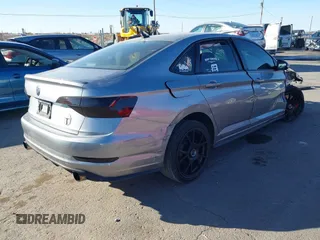 2021 Volkswagen Jetta GLI S with VIN 3VW6T7BU3MM013822, listed as a IAAI auction lot 41136536 with 96,582 mi miles and . Bid and sale history available at DreamBid. Image 4.