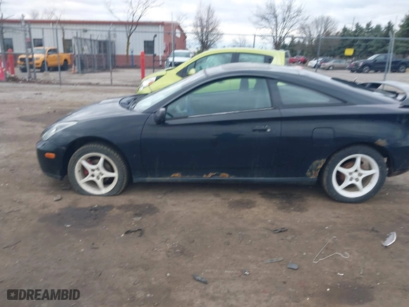 2000 Toyota Celica GT with VIN JTDDR32T7Y0006809, listed as a IAAI auction lot 41860933 with 262,014 mi miles. Bid and sale history available at carsss.com. Image 14.
