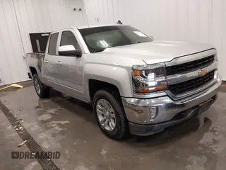 2019 Chevrolet Silverado 1500 LT with VIN 2GCVKPEC2K1105528, listed as a IAAI auction lot 41718796 with 95,999 mi miles and . Bid and sale history available at DreamBid. Image 1.