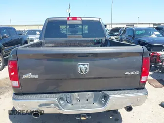 2018 Ram 1500 Big Horn z VIN 3C6RR7LT8JG140135, wystawiony jako IAAI lot #41984362 z przebiegiem 161 584 mil mil oraz . Historia ofert i sprzedaży dostępna na DreamBid. Obrazek 16.