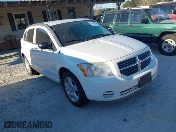 2009 Dodge Caliber SXT with VIN 1B3HB48A39D233105, listed as a IAAI auction lot 41872576 with Not Provided miles and . Bid and sale history available at DreamBid. Image 1.