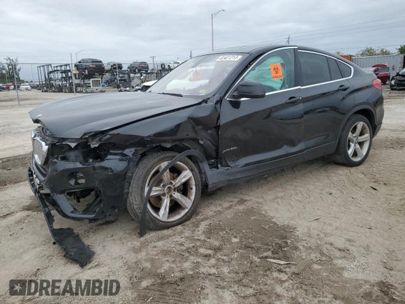 2015 BMW X4 xDrive28i with VIN 5UXXW3C51F0M88632, listed as a Copart auction lot 82401313 with 0 mi miles. Bid and sale history available at carsss.com. Image 1.
