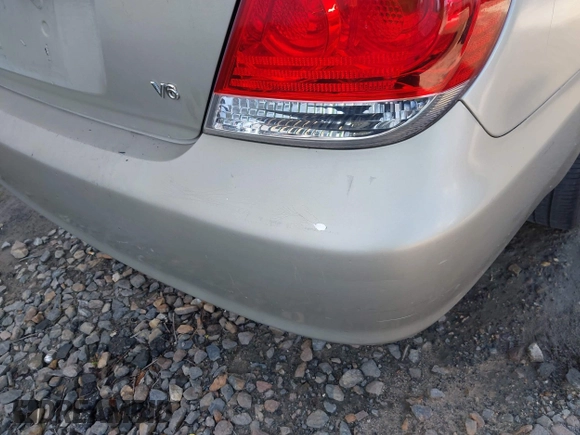 2005 Toyota Camry LE with VIN JTDBF32K050163858, listed as a IAAI auction lot 42004768 with 350,164 mi miles and . Bid and sale history available at DreamBid. Image 13.