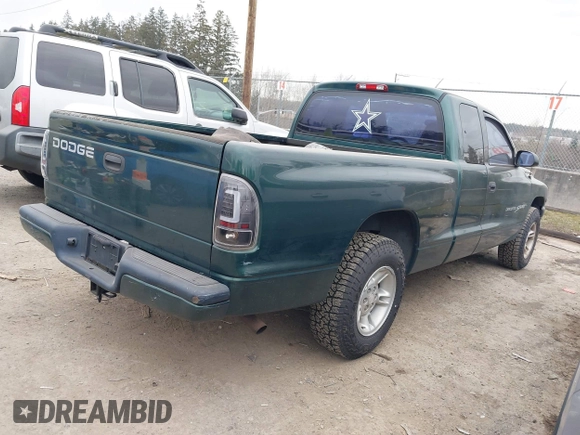 2000 Dodge Dakota Sport with VIN 1B7GL22N6YS764185, listed as a IAAI auction lot 41570275 with 157,334 mi miles. Bid and sale history available at carsss.com. Image 4.