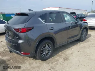 2017 Mazda CX-5 Touring with VIN JM3KFACLXH0125819, listed as a IAAI auction lot 41687038 with 101,769 mi miles. Bid and sale history available at carsss.com. Image 4.