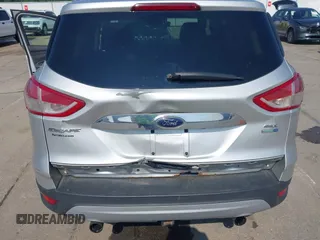 2013 Ford Escape SEL with VIN 1FMCU9H99DUA11243, listed as a IAAI auction lot 42356731 with 154,937 mi miles and . Bid and sale history available at DreamBid. Image 18.